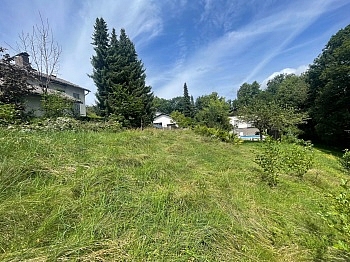übertragen Grundgrenze Wohngebiet - Schöner großer 1.176m² Baugrund in Wölfnitz - Hanglage