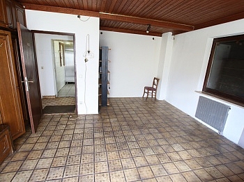 Liegenschaft OBERGESCHOSS Erdgeschoss - Wohn- und Geschäftshaus in Keutschach-Höflein mit 1.892m² Grundstück und 3 Garagen Nähe Rauschelesee